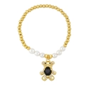 Minimalist pearl and gold bead bracelet featuring a teddy bear charm with a black heart stone - Black