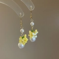 Detail of yellow flower earrings with white pearls and gold hooks for spring - Yellow Flower Cluster Pearl Style (Style 1)
