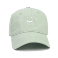 Mint green kids cotton baseball cap featuring a white smile embroidery on front - Kids 52-54cm / Light Green