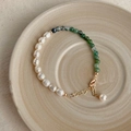 Detail view of Baroque pearl and green agate bead bracelet on a ceramic plate - Water Grass Stone Pearl Bracelet