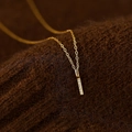 Elegant gold plated S925 silver bar necklace with pavé diamonds on brown knit sweater - Linear Bar / 925 Silver / Gold