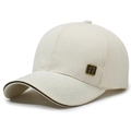 Men's cream baseball cap featuring a vintage metal badge and dark brown brim piping - Adjustable / Light Beige