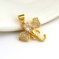 Macro shot of 18k gold plated elephant head pendant with sparkling zircon inlay details - Gold Plated Copper/Zirconia
