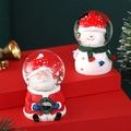 Christmas snow globe featuring Santa and Snowman with swirling white snow and festive decor - 4063# (lights + Snowflakes) / 45# (cardboard Box Packaging)