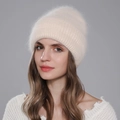 Plush cream white rabbit fur beanie with ribbed knit texture and stylish turn-up cuff - Beige