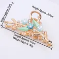 Floral alloy hair claw clip in champagne gold with blue enamel and pearls, 11cm length - HS02639 Blue