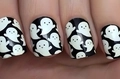 Macro shot of Halloween ghost pattern on short black and white press-on nails - Black and White Contrast Cute Ghost Style (CW307)