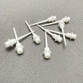 White plastic birthday cake topper base inserts for party decorations on grey background - Cupcake Tray Base