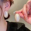 Eleganti orecchini ovali placcati in oro con perle bianche lucide per uno stile rétro chic - Orecchini Ovali Bianchi-Perno in Argento 925(4907707693609)