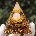 Tiger Eye Orgone Pyramid with gold lotus and crystal ball on a resin base - Pink Ball Tiger Eye / Small