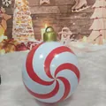Inflatable PVC Christmas ball with red and white spiral stripes and golden hook top - Red Candy