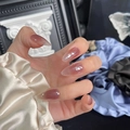 Detailed view of long oval nude pink gradient press-on nails with mirror finish - By1622 / Glue Type