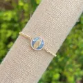 18K gold plated rope chain bracelet featuring a Virgin Mary pendant with cubic zirconia - Purple
