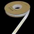 Close-up of white grosgrain ribbon with gold Love is Eternal foil printing on a spool - 1cm*33 Yards / White Gold