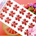 Detalle de pegatinas de cristal rojo con forma de flor para decoración infantil - Mariposa Rojo