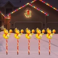 Solar Christmas snowman garden stake lights with red scarves and candy cane poles - Style 7