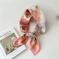Pink and white baroque silk scarf with gold scroll patterns tied in a stylish knot - Pink Gold Chain Emblem