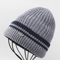 Grey knit winter beanie for men with blue stripes and sport metal tag on a display stand - Light Gray