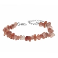 Detailed macro view of reddish-brown natural stone chips bracelet with silver lobster clasp - Strawberry Quartz
