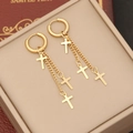 Detailed macro view of golden cross chain tassel earrings on a premium jewelry box - 7# Multiple Cross Tassel Style
