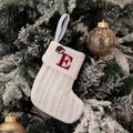 White knitted Christmas stocking with red embroidered letter E hanging on a snowy tree - Embroidered Knitted Small Sock White E