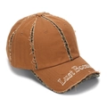 Close-up of distressed baseball cap with camo panels and white letter embroidery - One Size / Tan