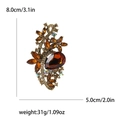Vintage golden floral brooch with amber gemstones and crystals, 8.0cm high, weight 31g - Yellow