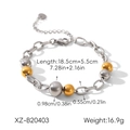 Detailweergave van de tweekleurige goud en zilver roestvrijstalen kralenarmband met sluiting - Goud Zilver Tweekleurige Ketting Kralen Armband