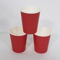 Three red disposable paper cups stacked in a pyramid shape on a white background - 10 Pieces Pack / Red