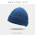 Classic blue ribbed knit beanie hat made of soft and comfortable fabric for winter - One Size / Blue