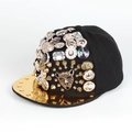 Detail of hip hop hat with golden leopard heads, mirror brim, and metallic studs - Gold Leopard Head Style (Leopard)