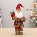 Stehender Weihnachtsmann in rotem Strickoutfit mit Laterne und Geschenksack 32cm - 32cm / Rot (T250039)