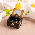 Hand-cranked black wooden Halloween music box with golden castle and pumpkin print - Halloween V