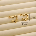 Detailed view of heart-shaped gold wave earrings measuring 2.3cm by 2.1cm size - R184 Heart Style 1 / Gold