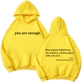 Vue avant et arrière du sweat à capuche en polaire jaune avec imprimé you are enough - Jaune