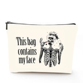 Detail of linen makeup bag featuring a skull print and 'This bag contains my face' text - Skeleton Lipstick