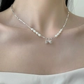 Silver bow necklace with white pearls on a minimalist choker chain for women - Bowknot Artificial Pearl Necklace (X2915) / Silver