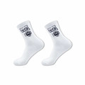 White crew socks featuring a black pixel art robot face with ribbed elastic cuffs - White (Funny Expression)