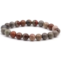 Macro view of 8mm multicolored tiger eye and natural stone beads on a single-strand bracelet - Ocean Jasper