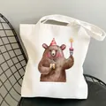 White canvas tote bag featuring a cute hand-painted birthday bear illustration with gift - C15 Birthday Celebration Bear