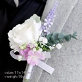 Groom boutonniere with white rose, lavender and eucalyptus on a gray suit lapel - White Rose Style (Series 3)