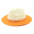 Detail of two-tone straw Panama hat featuring pearl beads and a wide orange brim - M (56-58cm) / Cream White + Orange