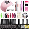 Macro shot of 54W UV LED nail lamp with gel polish colors and manicure tool accessories - USB Nail Lamp And Color Gel Polish Scheme D Upgrade Tool Kit (4-x4)