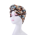 Detail of floral bohemian turban hat with twist knot on a white mannequin head - Style 7-Brown Blue Black Floral