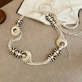 Detailed view of hand-woven cotton rope belt with geometric wooden rings and dark brown beads - 10# Wood Ring Woven Style (White)