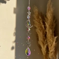 Detail of silver sun moon and star metal chains with sparkling crystal dreamcatcher prisms - Saturn Sun Star Silver Chain