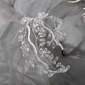 Elegant silver wire floral headband with clear crystal beads on soft tulle background - Crystal Headband-White