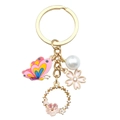 Porte-clés papillon doré avec fleur en émail rose, perle blanche et breloques cristal - Style Papillon Fleur Ajourée Rose (ER726)