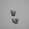 Macro shot of minimalist silver hollow teardrop earrings on a textured grey background - Small / White Gold