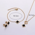 Detailansicht der 18k Gold quadratischen Ohrringe, Armband und Halskette Set - Schwarze Muschel Dreiteiliges Set